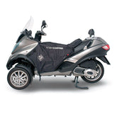 Coprigambe Termoscud R062WX, un coprigambe impermeabile e termico. Utilizzato su scooter. Di Tucano Urbano.